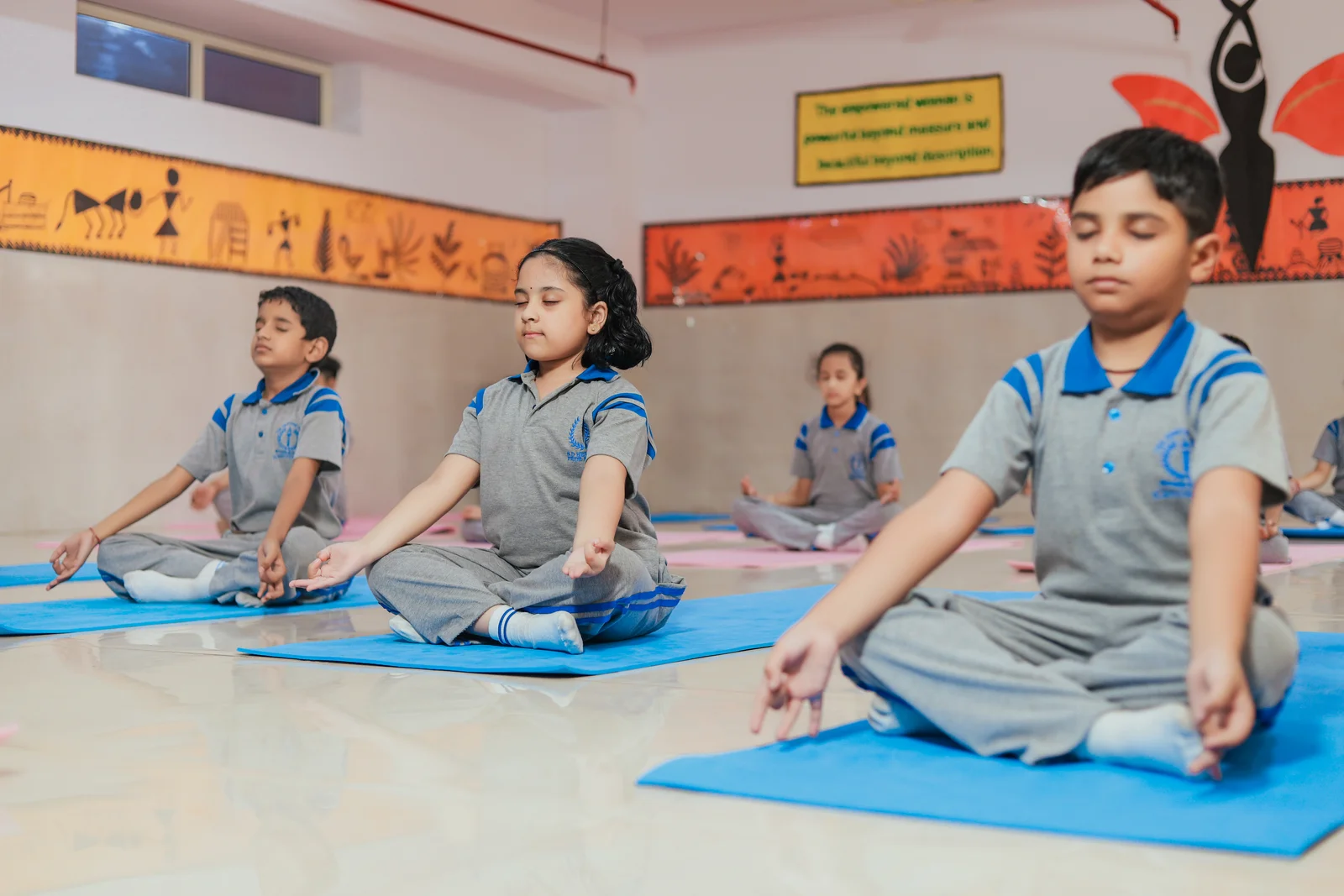 Students practicing yoga