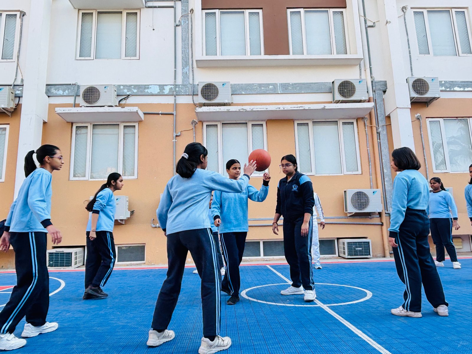Students practicing yoga